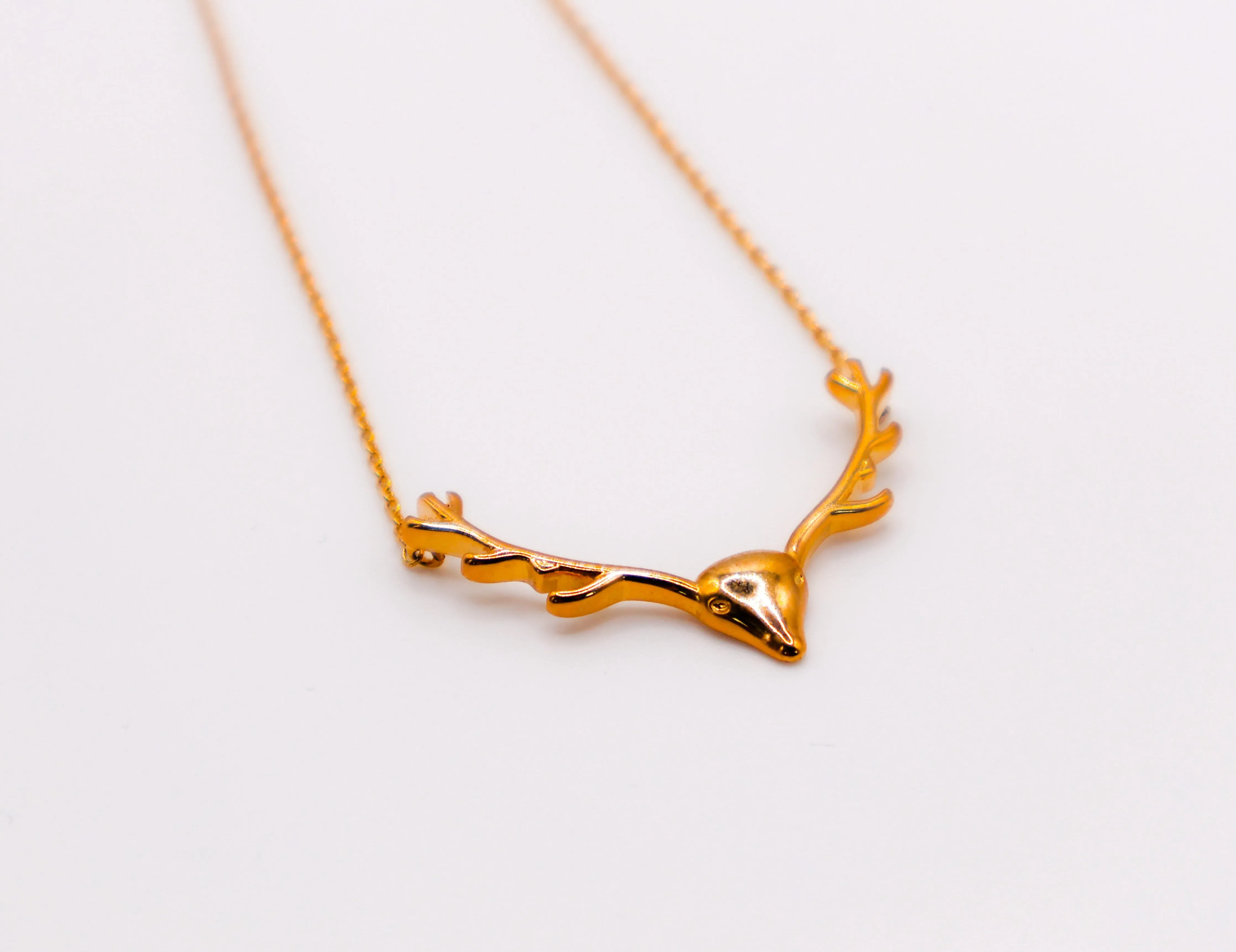 Golden Wilderness Antler Pendant