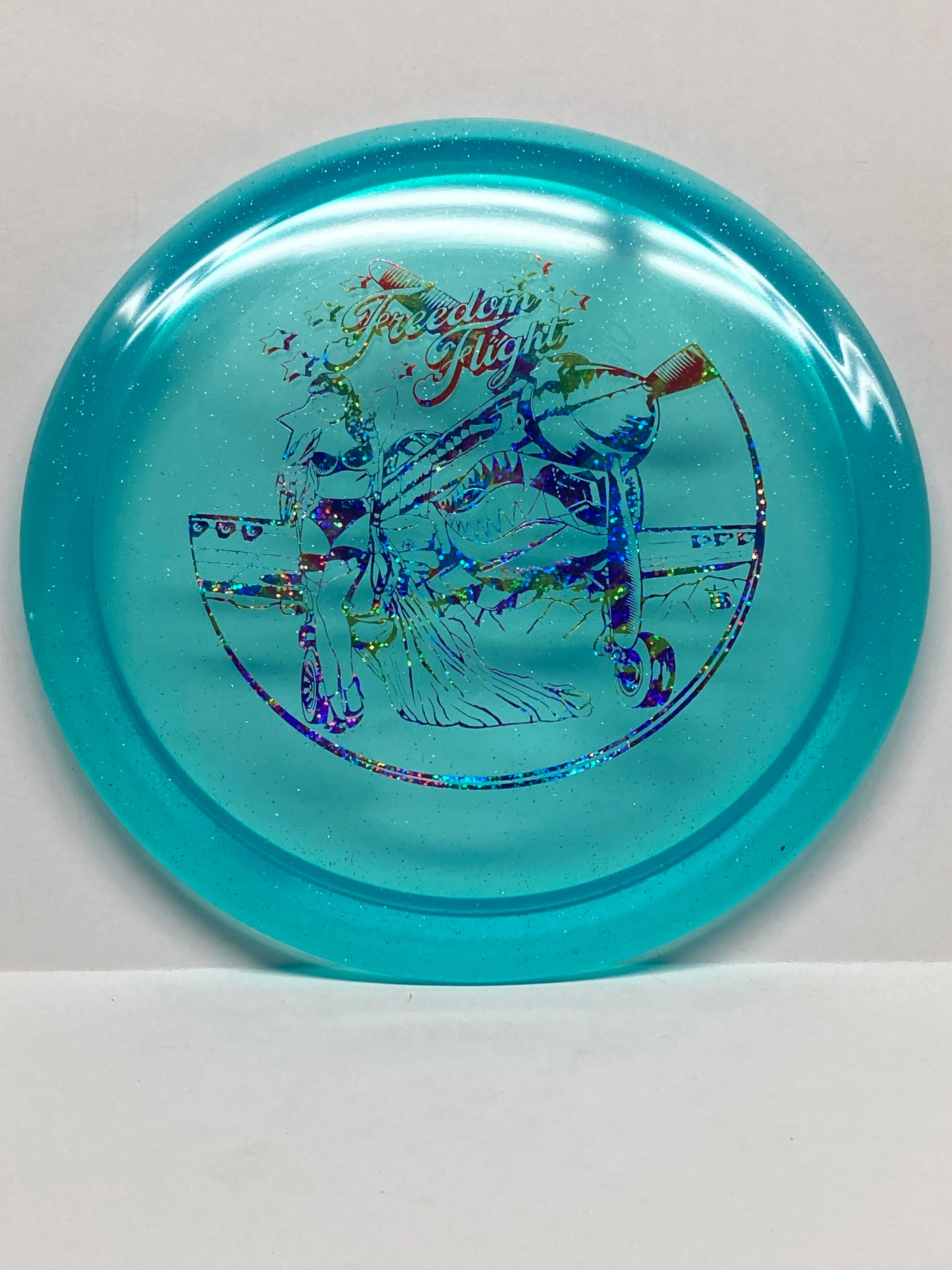 Latitude 64 Opto Explorer W/ “Pinup” Stamp