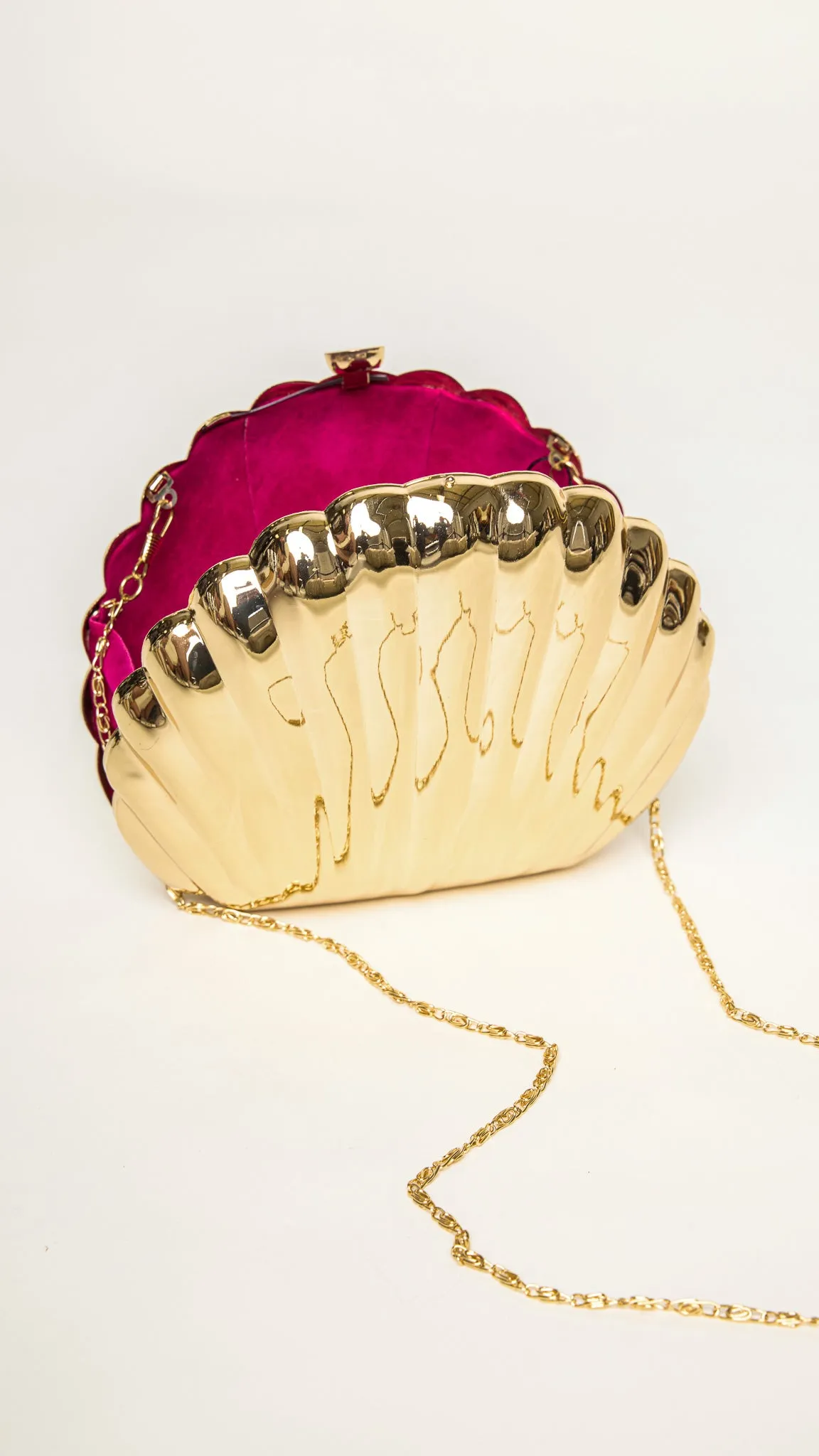 Shelly Shell-Shaped Gold Clutch