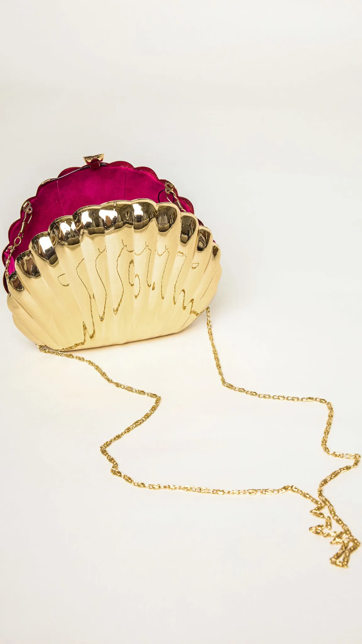 Shelly Shell-Shaped Gold Clutch